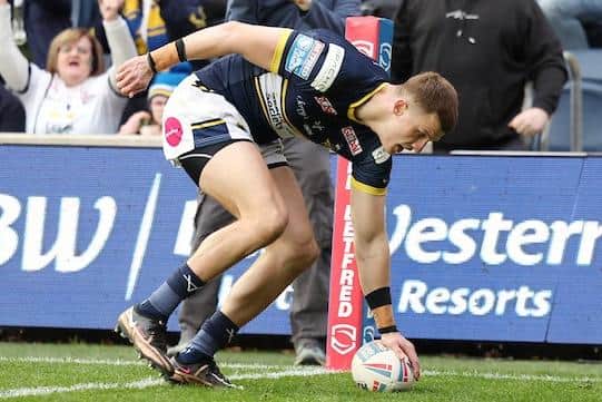 Ash Handley scores for Rhinos against Huddersfield in April. Picture by John Clifton/SWpix.com.