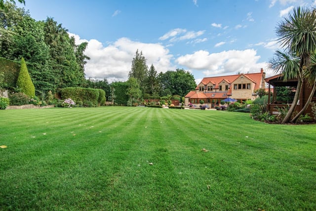 As well as a large rear garden, the property boasts equestrian facilities with six stables, a converted barn with living accommodation, a vehicle bay area designed to house tractors and trailers, and a large barn for storage.