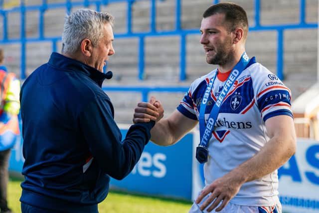 Max Jowitt seen with Daryl Powell after Wakefield Trinity won at Warrington Wolves last season. Picture by Alex Whitehead/SWpix.com.