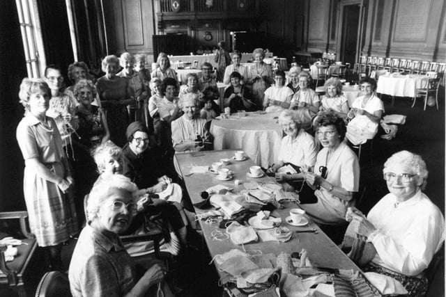 Women's Circle members and friends set those needles clicking for charity when they joined former Lady Mayoress of Leeds, Beatrice Symonds, in a sponsored knit for the Yorkshire Evening Post Half and Half Appeal at Leeds Civic Hall in July 1987.