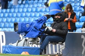 LEEDS, ENGLAND - MARCH 11: A TV Camera Operator looks on prior to the Premier League match between Leeds United and Brighton & Hove Albion at Elland Road on March 11, 2023 in Leeds, England. (Photo by Stu Forster/Getty Images)