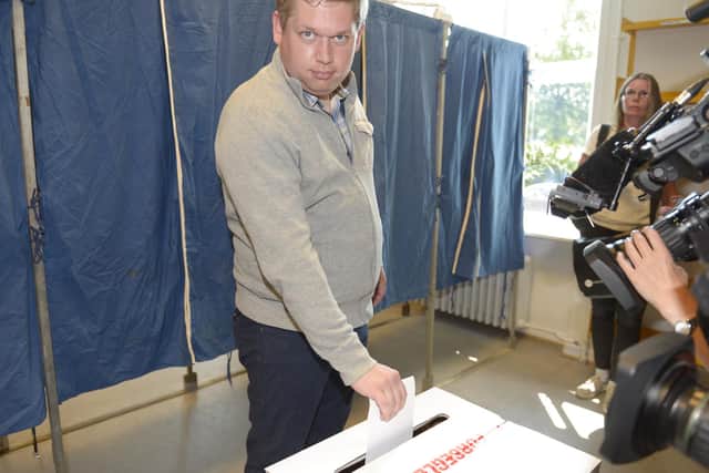 Rasmus Paludan, leader of Danish right wing party Stram Kurs, casts his vote at the Vesterbro public library polling station on June 5, 2019 in Copenhagen, during the parliamentary elections 2019. (Photo by Henning Bagger / Ritzau Scanpix / AFP)