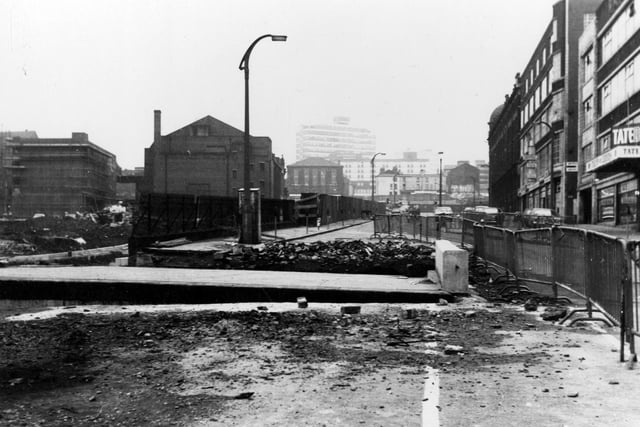 The Merrion Hotel is visible in the distance and shops to the right in November 1968. Construction work of New York Road is in progress.