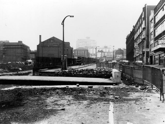 The Merrion Hotel is visible in the distance and shops to the right in November 1968. Construction work of New York Road is in progress.