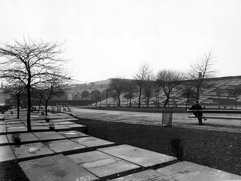 A man sits on a park bench in Marsh Lane Recreation Ground in March 1944.