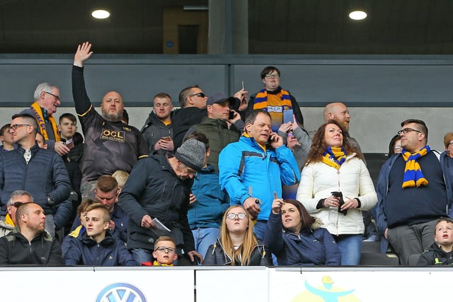 It was a day to forget for these fans as Stags blew their automatic promotion hopes with a 1-0 defeat at Stadium MK.