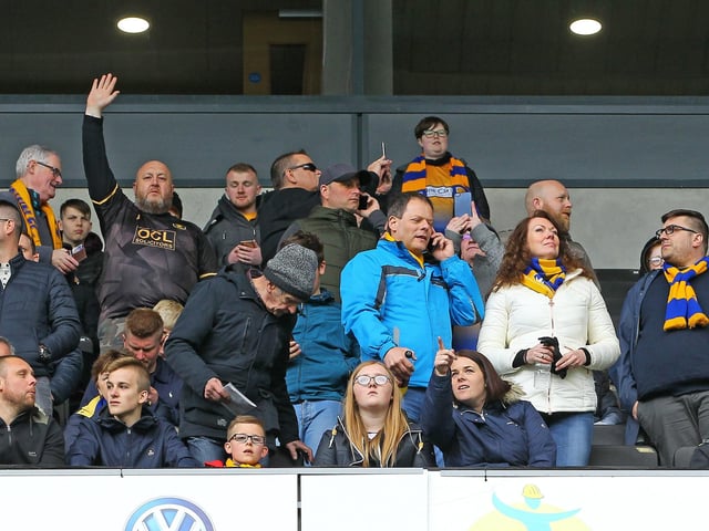 It was a day to forget for these fans as Stags blew their automatic promotion hopes with a 1-0 defeat at Stadium MK.