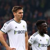 Max Wober and Wilfried Gnonto of Leeds United look dejected following the team's defeat in the Premier League match between AFC Bournemouth and Leeds United at Vitality Stadium on April 30, 2023 in Bournemouth, England. (Photo by Michael Steele/Getty Images)