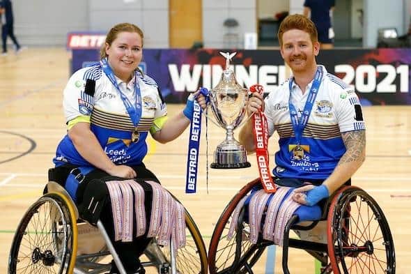 Jodie Boyd-Ward and James Simpson, who is now Rhinos' coach, with the Challenge Cup after beating Argonauts Skeleton Army in the 2021 final. Picture by Ed Sykes/SWpix.com.