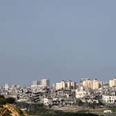 A picture taken from the southern Israeli city of Sderot on October 20, 2023, shows damage buildings amid the ongoing battles between Israel and the Palestinian group Hamas. Picture: AFP via Getty Images.