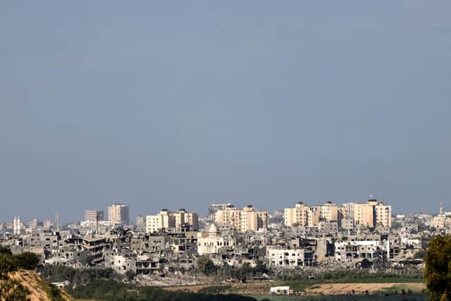 A picture taken from the southern Israeli city of Sderot on October 20, 2023, shows damage buildings amid the ongoing battles between Israel and the Palestinian group Hamas. Picture: AFP via Getty Images.