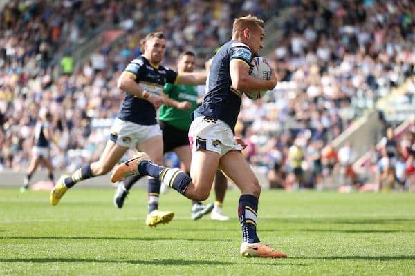 Luke Hooley scores his first Super League try, in Rhinos' 24-22 win over Warrington. Picture by John Clifton/SWpix.com.
