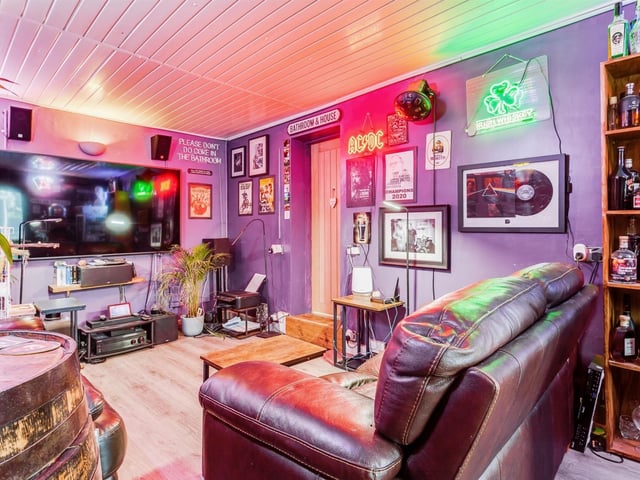 The cinema with bar room is one feature of the spacious bungalow.