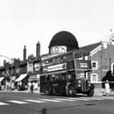The junction of Roundhay Road, on the left and Karnac Road on the right in August 1962. In the centre of the image number 68 Harehills/Easterly Road bus approaches a zebra crossing on its way back to the Central Bus Station. On the side of the bus an advertisement promotes 'Mckay, Immaculate Shirts, Calpreta wonder dry finish'. The parade of shops behind the bus was demolished in 1968 however the building with the clock dome number 250 is The Picture House. This 900 seat cinema opened on Monday, December 16,  1912 showing 'The Mine Owner' and closed Saturday, October 5, 1963, showing 'Last Days of Pompeii'. On Friday, October 11, 1963, it went into use as a bingo hall.