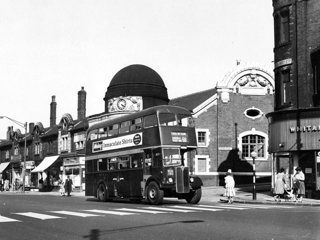The junction of Roundhay Road, on the left and Karnac Road on the right in August 1962. In the centre of the image number 68 Harehills/Easterly Road bus approaches a zebra crossing on its way back to the Central Bus Station. The parade of shops behind the bus was demolished in 1968 however the building with the clock dome number 250 is The Picture House. This 900 seat cinema opened on Monday, December 16, 1912 showing 'The Mine Owner' and closed Saturday, October 5, 1963, showing 'Last Days of Pompeii'. On Friday, October 11, 1963, it went into use as a bingo hall.