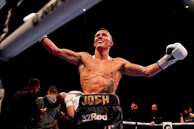 Josh Warrington celebrates winning his IBF world featherweight title fight against Kiko Martinez at the First Direct Arena, Leeds, last year. Picture by Martin Rickett/PA Wire.