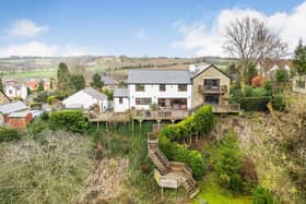 Steps lead down from the house and through gardens to the River Wharfe.