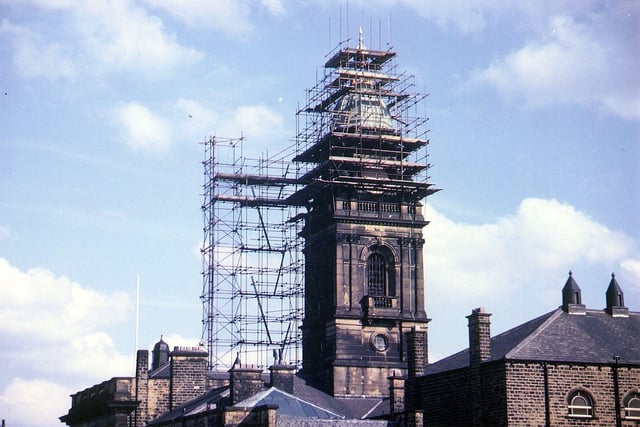 Reconstruction work on the dome of Morley Town Hall is almost complete in this photograph from October 1962 showing the tower surrounded by scaffolding. The dome had been damaged following a fire on August 18, 1961.