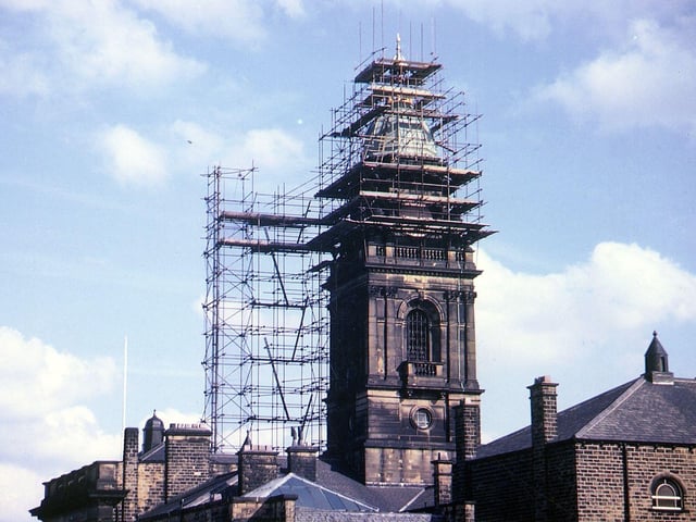 Reconstruction work on the dome of Morley Town Hall is almost complete in this photograph from October 1962 showing the tower surrounded by scaffolding. The dome had been damaged following a fire on August 18, 1961.
