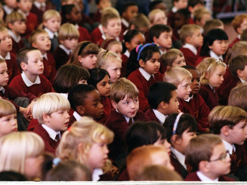 Pupils at Archbishop Cranmer C of E Primary School in Alwoodley listen to head teacher Jim McHugh during assembly in November 1996.