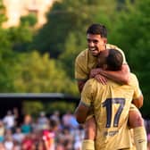OLOT, SPAIN - JULY 13: Pierre-Emerick Aubameyang of FC Barcelona celebrates with his teammate Ilias Akhomach after scoring their team's first goal during the pre-season friendly match between UE Olot and FC Barcelona at Nou Estadi Municipal on July 13, 2022 in Olot, Spain. (Photo by Alex Caparros/Getty Images)