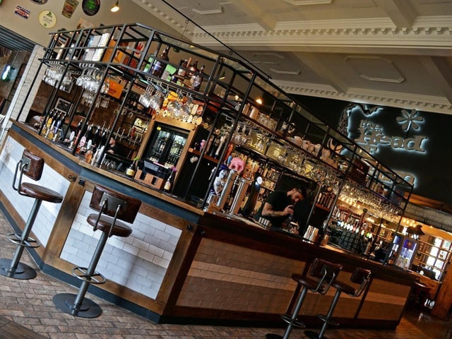12 Mill Hill. “Inside, on the octagonal island bar, beers from all around the world are available including a good range of cask ales and Belgian beers.”