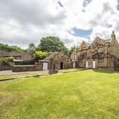 An historic Hall with attractive gardens is a comfortable home with potential for development.