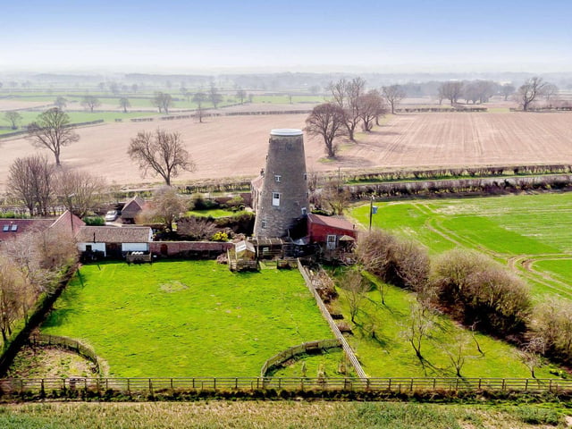 The property has charming gardens and is surrounded by farmland and countryside
