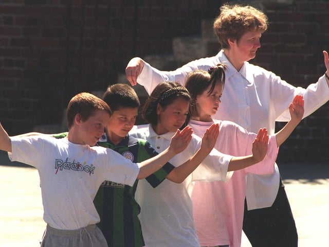 Yorkshire Dance Centre teacher Christine Roberts, teaches pupils at Upper Wortley Primary School how to do Tai Chi in July 1996. Pictured, from left, are Joe Wainhouse, Dale Crossley, Rebecca Chim and  Lyndsay Owen