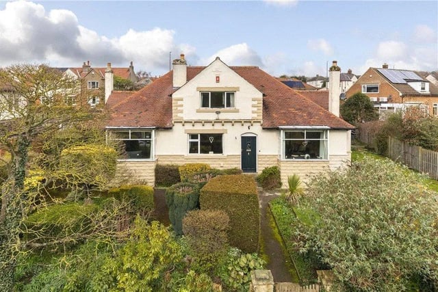 A substantial four bedroom, detached 1930s family home is on the market with scope for further extension. There is a study and three ground floor reception areas in superb gardens with parking, a car port and a detached garage.