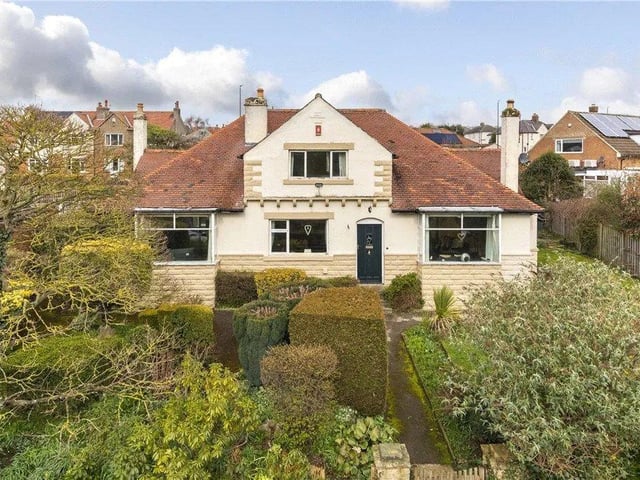 A substantial four bedroom, detached 1930s family home is on the market with scope for further extension. There is a study and three ground floor reception areas in superb gardens with parking, a car port and a detached garage.