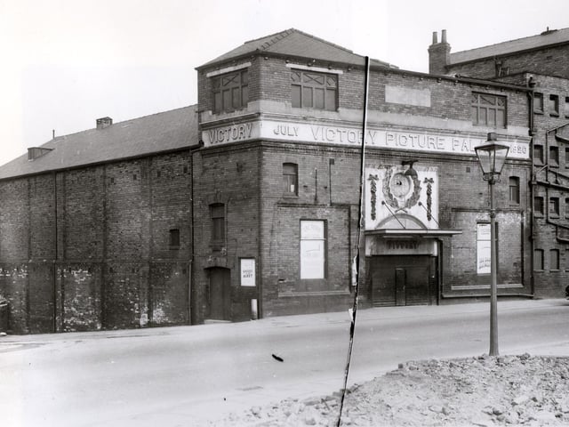 The Victory Cinema on Camp Road in April 1958. The cinema has carved stone band with the name 'Victory Picture Palace' and the date July 1920. Cinema historians give the exact opening date as August 16, 1920. It was closed on January 19, 1959. The adjacent building to the right was the Victory Halls, at this time it was Sassoons tailoring factoring. Crawford Street is to the left.