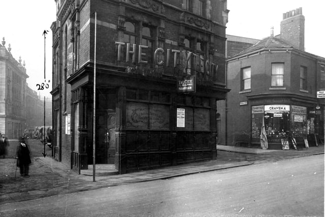 The City public house and restaurant, situated on Woodhouse Lane between Wormald Row (left) and De Grey Street in March 1933. Maria H. Deacon was the licensee at the time.