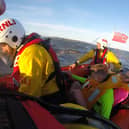 The rowers were rescued by the RNLI after their boat capsizes off the coast of Whitby (Photo by RNLI/SWNS)