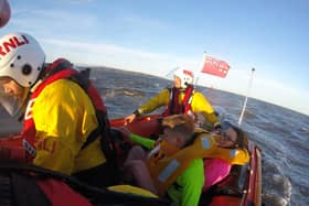 The rowers were rescued by the RNLI after their boat capsizes off the coast of Whitby (Photo by RNLI/SWNS)