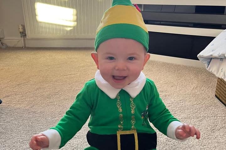 Eight month old Joah dressed as an Elf. Submitted by Becki Rushfirth.