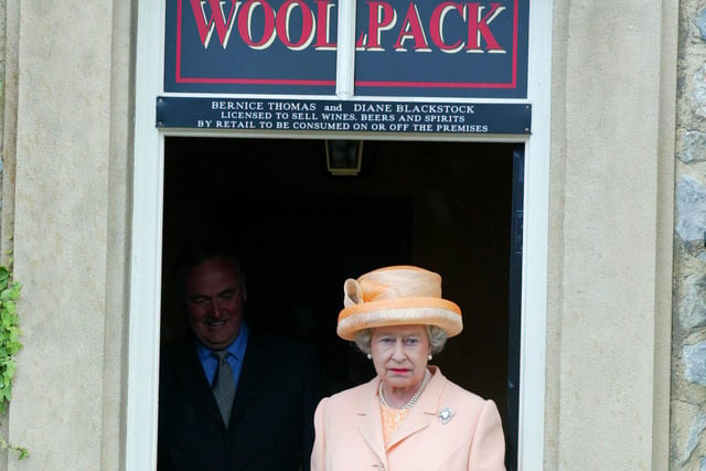 The Queen leaves the Woolpack during a visit to the set of Emmerdale.
