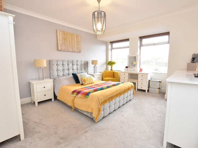 A second reception room has ceiling coving and a window to the front and there are three good sized double bedrooms – two are en-suite.