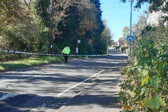Police remain at the scene on Rooks Nest Road after the girl was found lying in the road close to a bus stop.