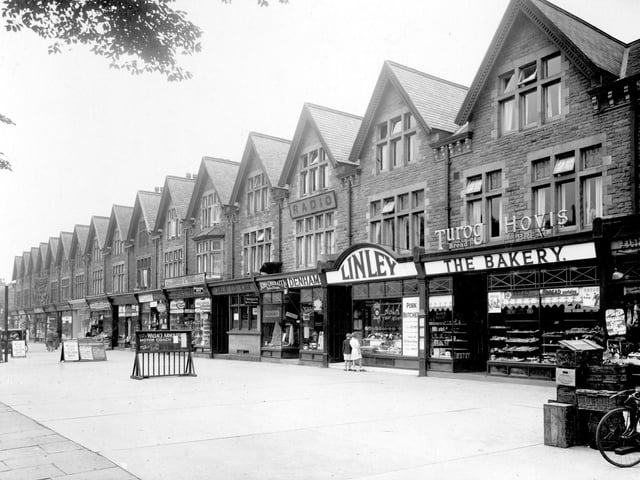 Shops on Street Lane pictured in August 1935. To the left no 39, at the junction with Shaftesbury Avenue ending with No 71 on the right. This is a bakers shop, business of Miss Florence Gadsby.