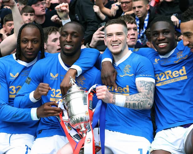 WINNER: Glen Kamara, second left, with former Rangers teammates Joe Aribo, Ryan Kent, Calvin Bassey and Connor Goldson with the 2022 Scottish Cup. Photo by Ian MacNicol/Getty Images.