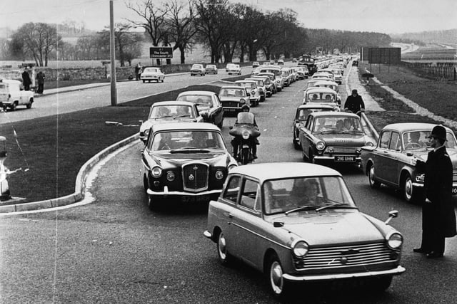 A queue on the A1 south of Wetherby at the junction with the Leeds Road, which carried a line of cars right back to Collingham in April 1966.