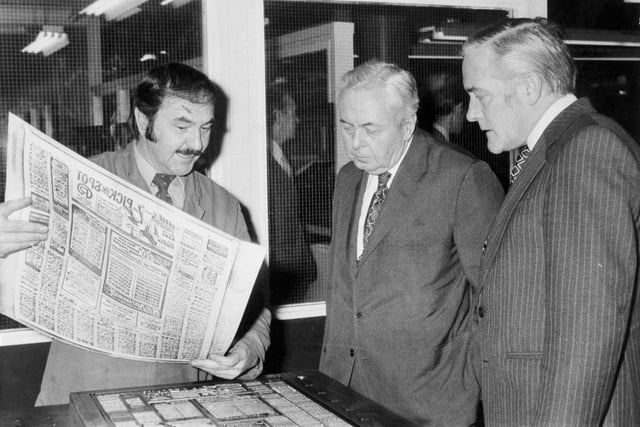 Sir Harold Wilson is shown a page being made ready for the presses by Tony Laycock from the stereo department during a visit to the Yorkshire Evening Post on Wellington Street in January 1977.