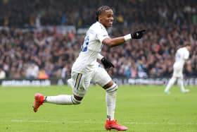 DIFFERENT FEEL: Hailed by Whites winger Crysencio Summerville, above, at Leeds United this year, the Dutchman pictured celebrating his strike in October's victory against Huddersfield Town at Elland Road. Photo by George Wood/Getty Images.