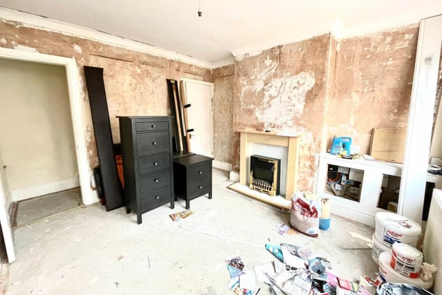 As you can see from this photo of the reception room, the interior of the house is in need of modernisation. But that might suit those who love a project.