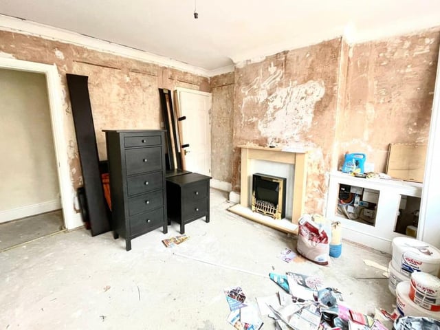 As you can see from this photo of the reception room, the interior of the house is in need of modernisation. But that might suit those who love a project.