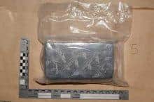 This block of drugs was recovered during the operation. Image: West Yorkshire Police