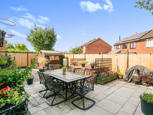 Benefitting from double glazing and solar panels, the house also has a fantastic garden with a seating area – ideal for family gatherings.