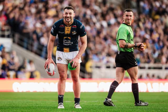 Referee Jack Smith with Jake Connor during Leeds Rhinos' 52-0 win against Huddersfield Giants at AMT Headingley two weeks ago. Picture by Alex Whitehead/SWpix.com.