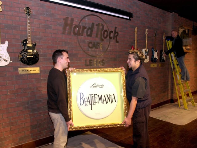 John Wright, Danny Guerra and Steve Smith help to arrange some of the memorabilia in November 2002 which arrived from the USA ahead of the opening.